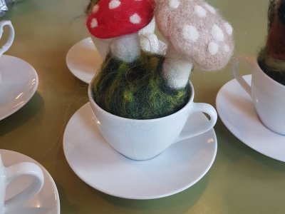 Pin cushion in a tea cup