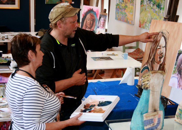 Portrait painting student with artist Mic Chambers