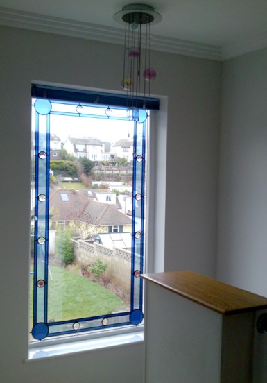 Stairwell window with Jewels.